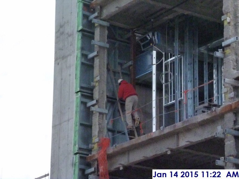 Aligning stone panels at the 2nd floor East Elevation